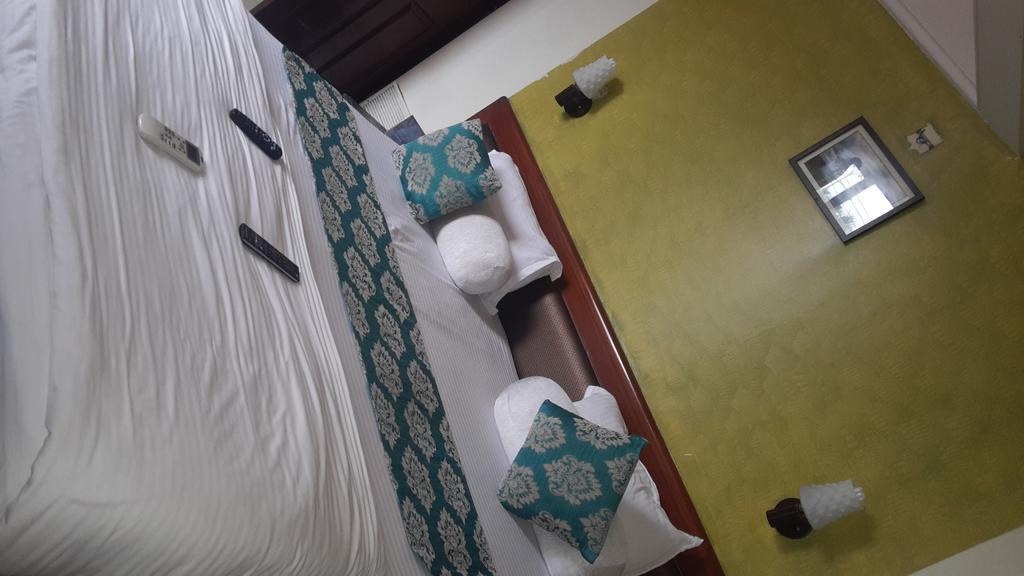 Hotel Peace Park Панвел Екстериор снимка